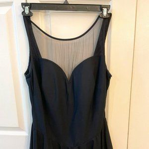 Plus size 1-piece black swimsuit by Robbie Len